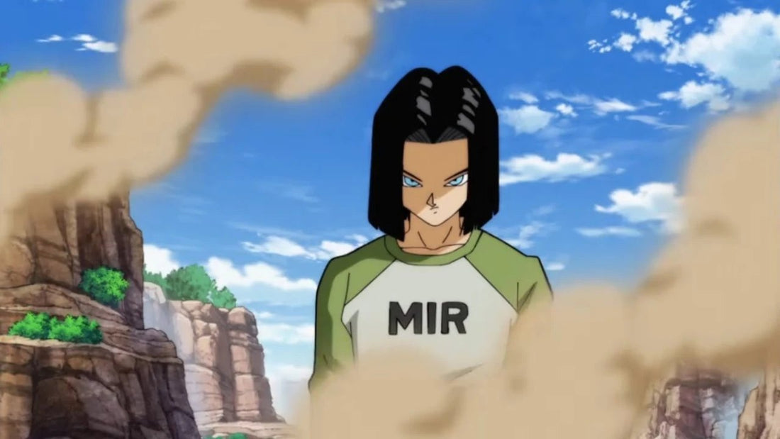 Android 17, with medium-length black hair and blue eyes, in a white T-shirt with green sleeves marked MIR, standing among clouds of dust under a blue sky